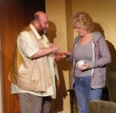 Ted (Colin Clark) gives May (Lesley Anderson) her pills.